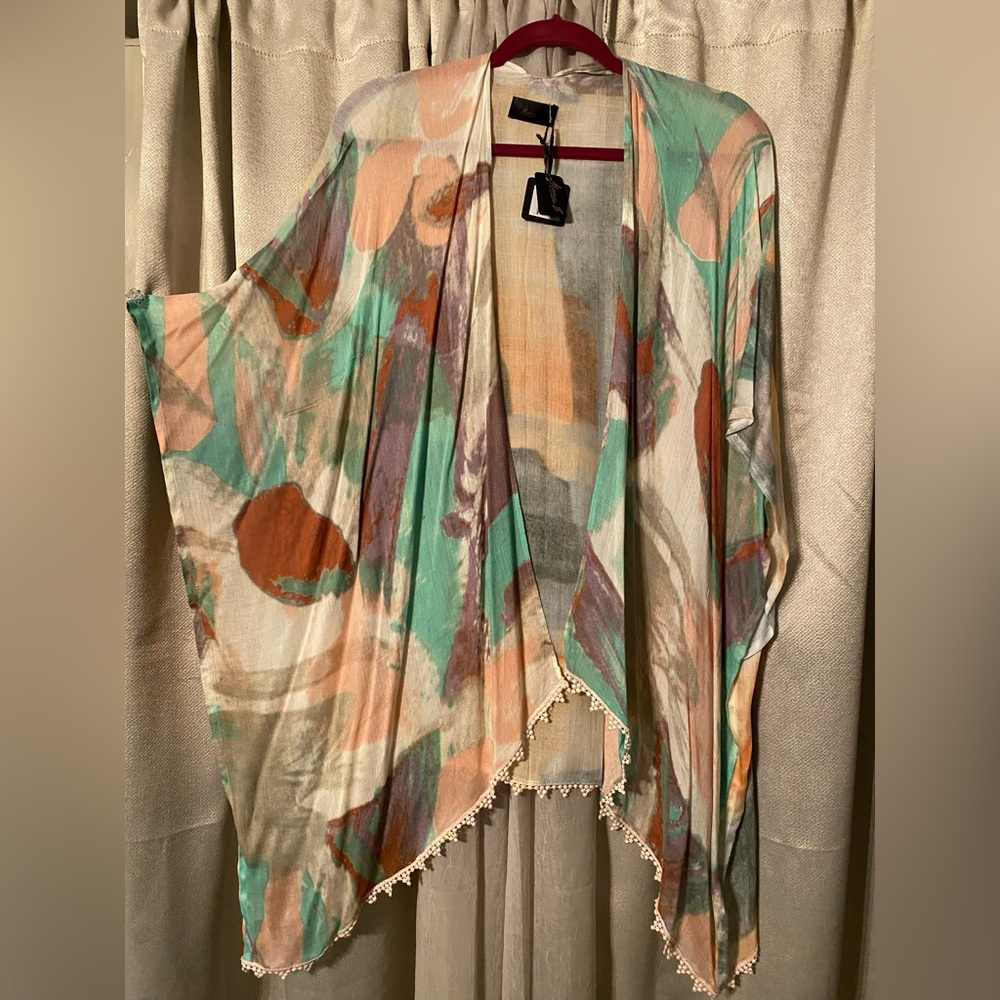 New with tags. Multi colored kimono.